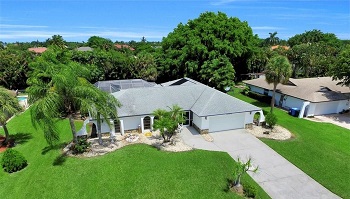 Bildlink zur Auswertung von Häusern mit Pool in Fort Myers bis $399.999