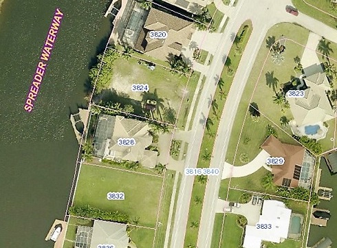 Picture showing a Building site in Cape Coral for a New Construction project of a new home on a canal