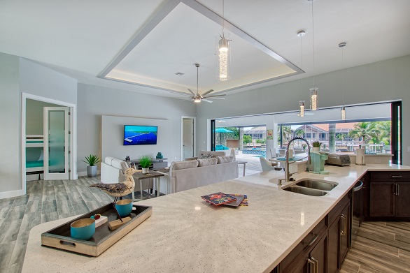 Picture of the New Construction Model Royal Palm 3 showing the living room through the kitchen area