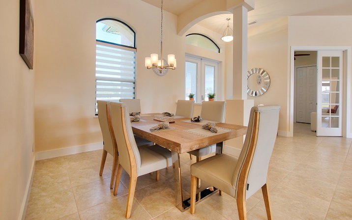 Picture of the New Construction Model Sunset Bay 2 version 2 showing the dining area and entrance