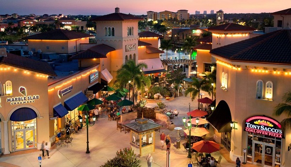Picture showing the shops at Coconut Point Mall in the evening